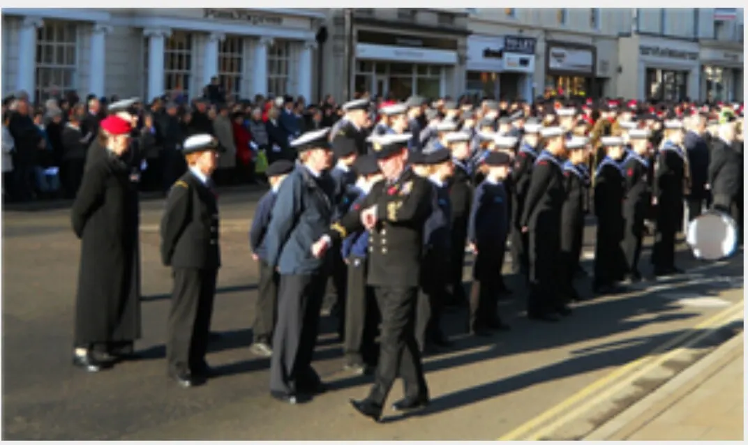 Uniformed cadets and veterans marching in a Remembrance parade